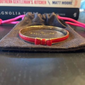 Kate Spade red and gold bow bangle. Great condition! Minor wear.